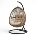 Hängesessel aus Rattan mit Metallgestell und Kissen in Beige